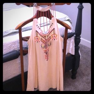 Boho style, casual dress with super cute back.